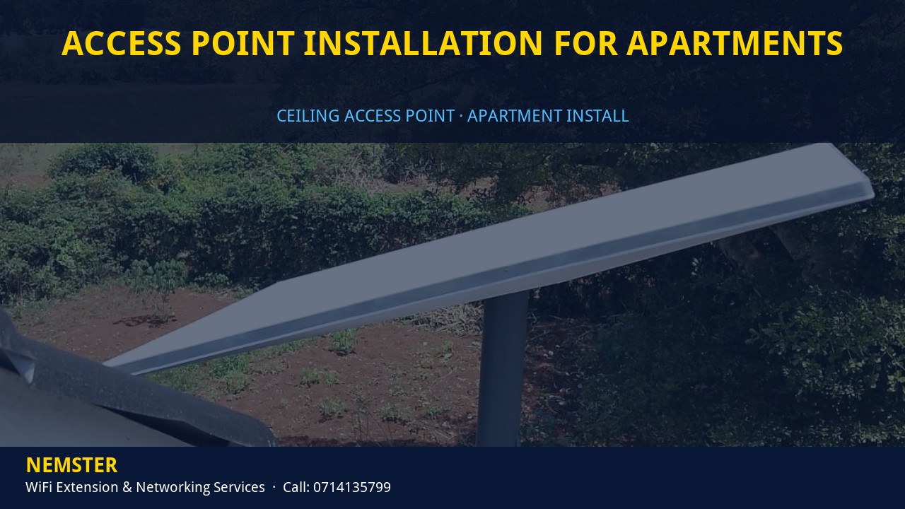 Access Point Installation for Apartments | Ceiling Ap Install | Nemster Technician installing a ceiling WiFi access point in an apartment corridor — Access Point Installation for Apartments by Nemster in Nairobi & Kenya