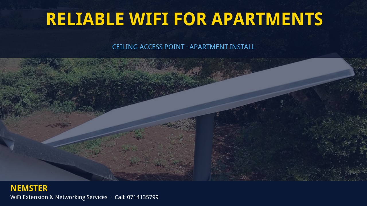 Technician installing a ceiling WiFi access point in an apartment corridor — Reliable WiFi for Apartments by Nemster in Nairobi & Kenya